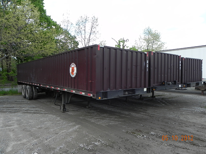 Container trailers staged in the secure outdoor storage yard